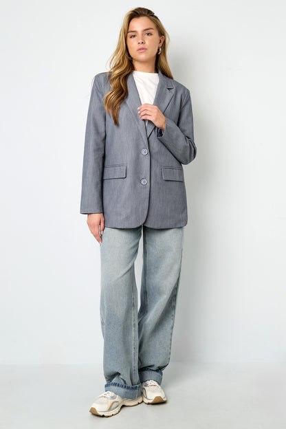 Blazer met Statement Rugprint